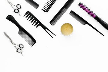 female hairdresser desk with accessories and combs on white background top view mockup