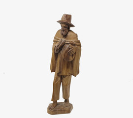 Carved wooden figurine of barefoot bearded peasant with hat and small sack - Ecuador