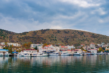 Fototapeta na wymiar Small yachts in the port of Balaklava in the Crimea