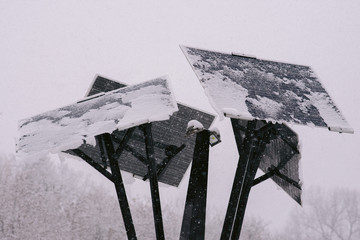 solar panels covered with snow