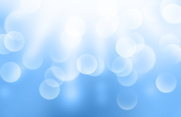 Lights or blurred bokeh on blue gradient background