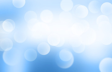 Lights or blurred bokeh on blue gradient background
