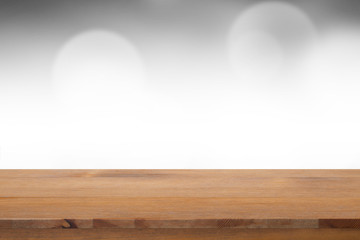 Empty of desk with blurred light gray gradient bokeh abstract background
