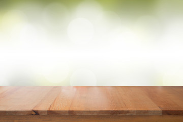 Empty of desk with blurred light green gradient bokeh abstract background