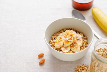 Bowl of oatmeal with banana slieces