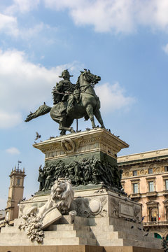 Vittorio Emanuele statue monument with lion in the center of Milan, Italy