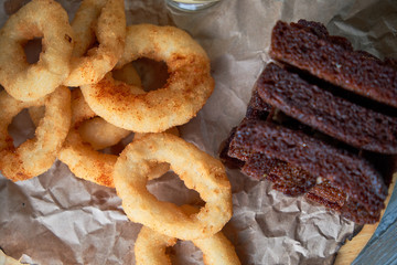 a variety of snacks for light beer in a glass