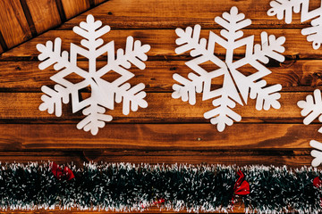 snowflakes on a wooden wall