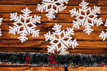 snowflakes on a wooden wall