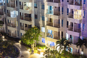 Apartment windows at night.