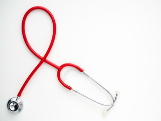 Red Stethoscope isolated on white background.