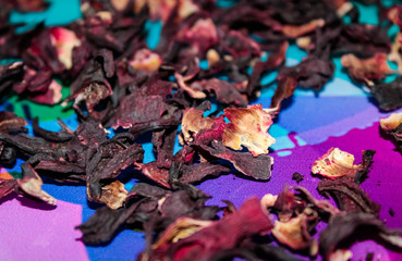 Dry petals of hibiscus texture background. Hibiscus tea close-up