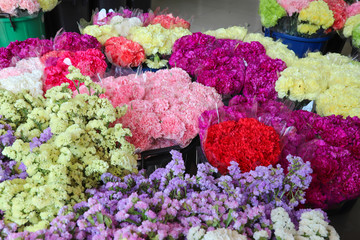 .Closeup of several kinds of flower packs preparing for selling at flower shop. The lovely gift for special social event. 