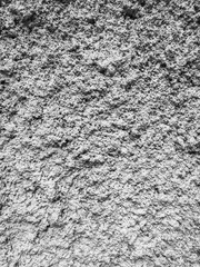 Gray plaster coat on the wall as a background