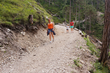 People travel through the mountains on foot.