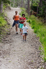 People travel through the mountains on foot.