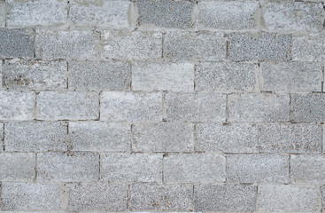 Surface texture gray-brown stone tiles, close-up, abstract background grunge
