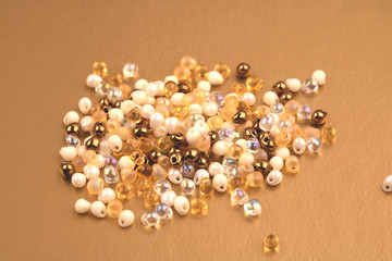 Bunch of beads of golden bright shades.