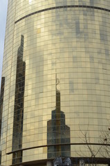 Fototapeta na wymiar reflections on a modern building