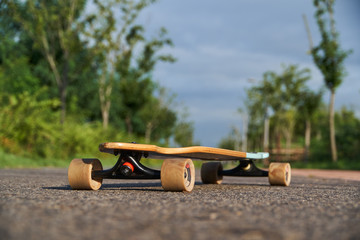 longboard on a road