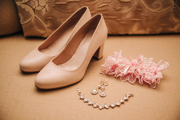 Obraz premium shoes, necklace and earrings for the bride