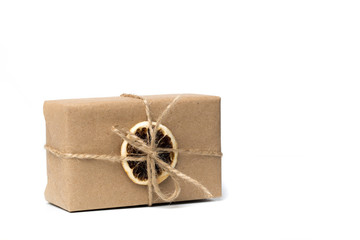 craft paper presents with dry citrus isolated on white.