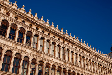 Fototapeta na wymiar Basilica di San Marco in Venice, Italy against bright blue sky