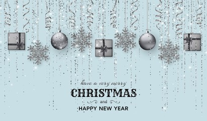 Merry Christmas background with shiny snowflakes, silver balls, gift boxes and grey colored tinsel and streamer. Greeting card and Xmas template