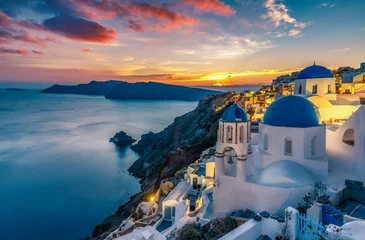 Acrylic prints Santorini Beautiful view of Churches in Oia village, Santorini island in Greece at sunset, with dramatic sky.