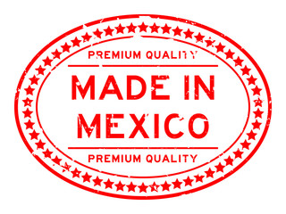 Grunge red premium quality made in Mexico oval rubber seal stamp on white background