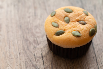 Mamon cake or cupcake on wooden desk background