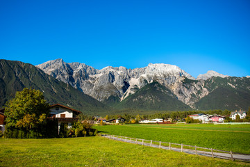 Fototapeta na wymiar Austria houses and mountains