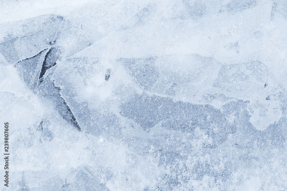 Poster close-up of snow on cracked and thin layers of ice in the winter. simple and minimal full frame abst