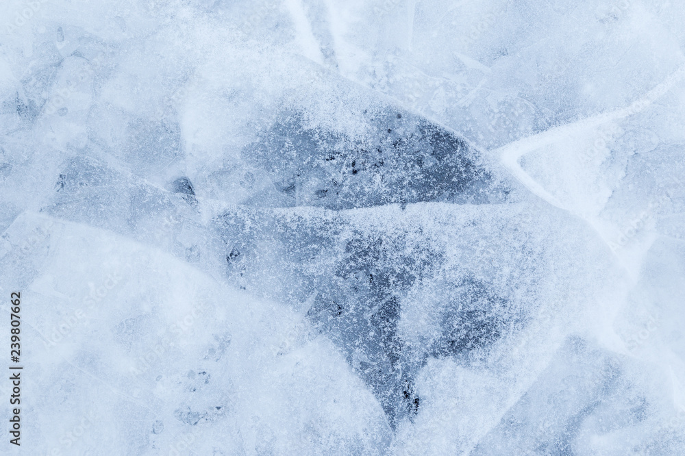 Poster close-up of snow on cracked and thin layers of ice in the winter. simple and minimal full frame abst