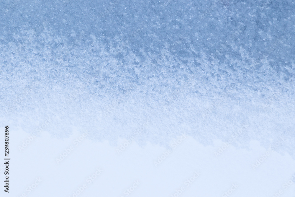 Poster full frame background of snow on light blue ice in the winter. simple and minimal abstract backgroun