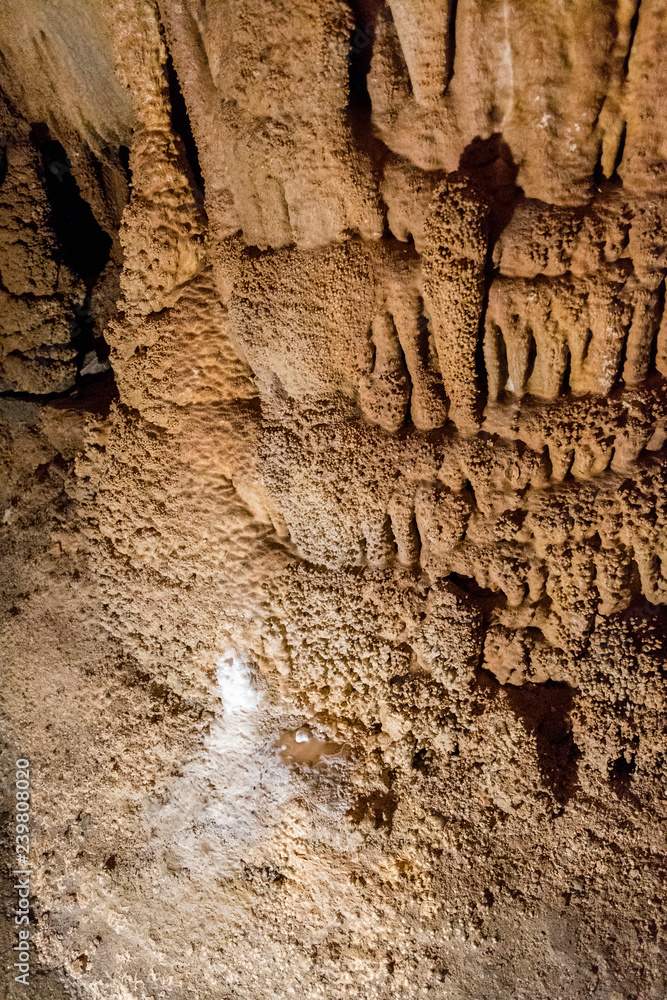 Poster stalagmit in the cave.