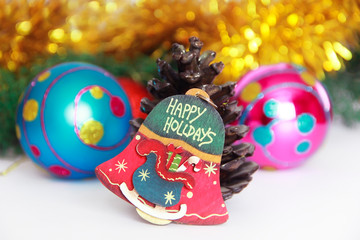 Christmas decorative multicolored bell on a New Year background
