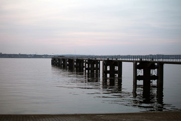 Fototapeta na wymiar pier on the background of the sea
