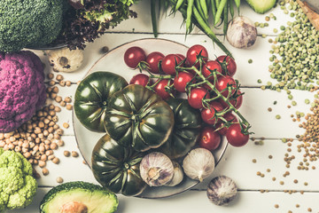 Winter vegetarian, vegan food cooking ingredients,white wooden background, top view,.with different vegetables and beans.