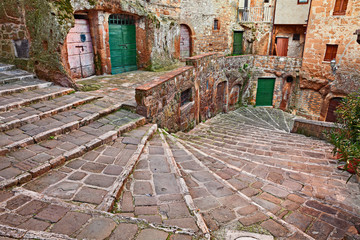 Fototapeta na wymiar Pitigliano, Tuscany, Italy: ancient staircase in the old town