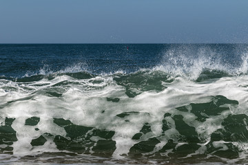 Splashing Atlantic ocean wave, Nazare, Portugal.