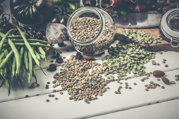Winter vegetarian, vegan food cooking ingredients,white wooden background, top view,.with different...