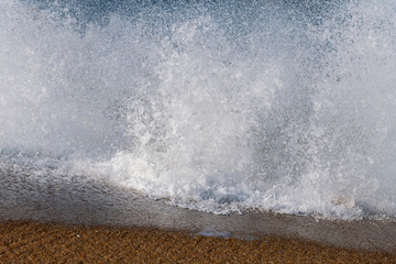 Splashing Atlantic ocean wave, Nazare, Portugal.