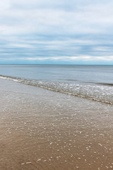 Fototapeta na wymiar Calm and grey Baltic sea.