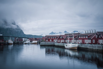 Fototapeta na wymiar Harbour of the Lofoten village harbour on the rainy day