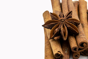 sticks of cinnamon star anise Brown isolate on a white background close-up