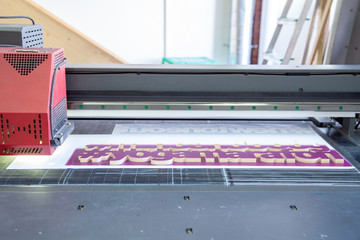 UV machine prints on wooden letters