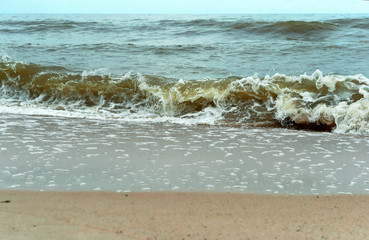 Sea coast. Waves and storms at sea. Waves on the Baltic Sea.