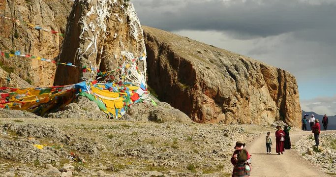 4k Prayer flags at the lake namtso in tibet,ancient holy monk meditation in cave,ZhaXi Peninsula,tibet mansarovar,Tibet's second largest lake,is the third largest saltwater lake in China.