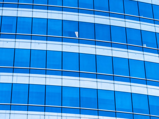 Fototapeta na wymiar Beautiful business office building skyscraper with window glass